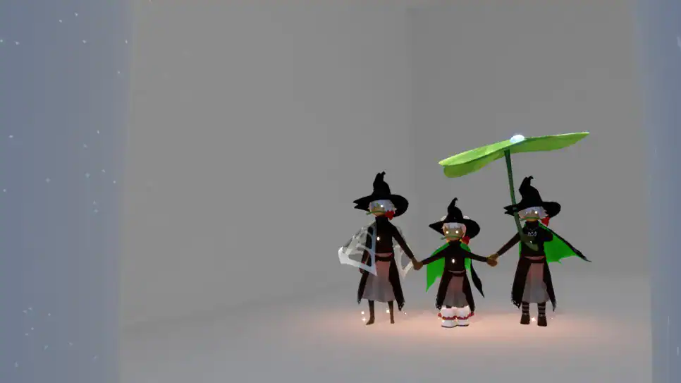 穏やかな雰囲気の男女3人が手を取り合って写真を撮っている。