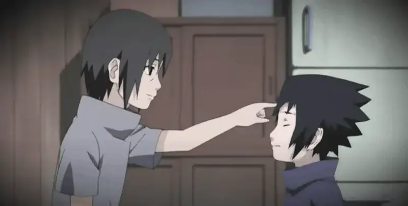 Naruto's Itachi poking Sasuke's forehead with his finger