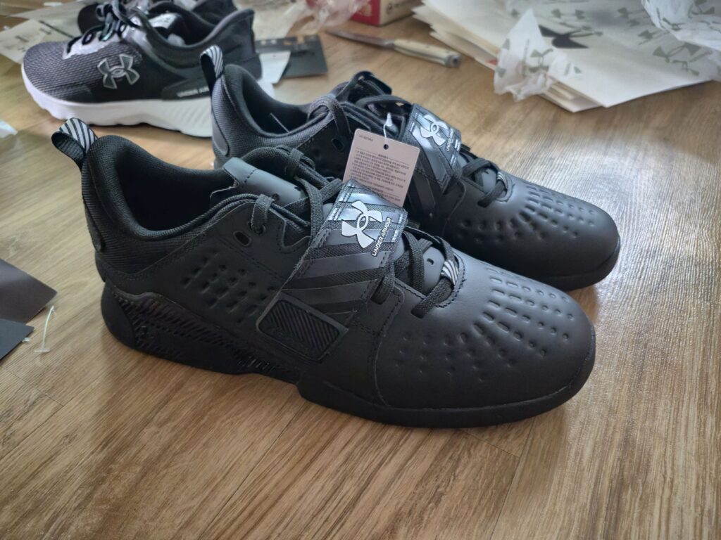 Black Under Armour lifting shoes.