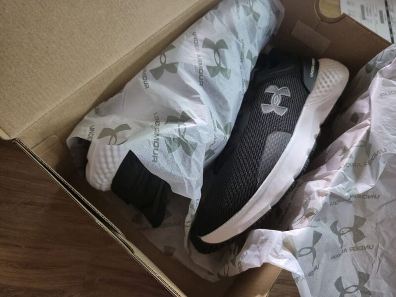 Packaging of the Under Armour running shoes.