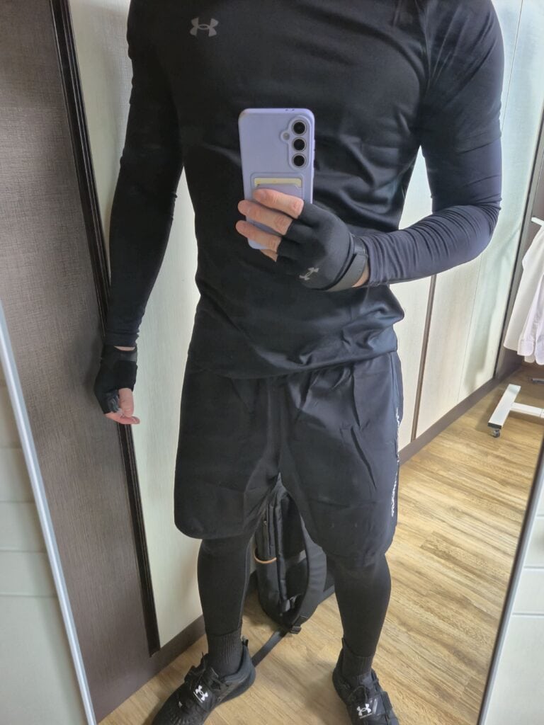 Wearing the full Under Armour set. The colors are matched in black.